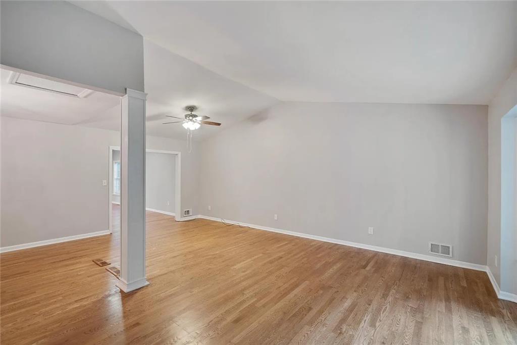 9825 Coleman Road Roswell, GA 30075 - Photo 8 of 17 a view of a room with wooden floor
