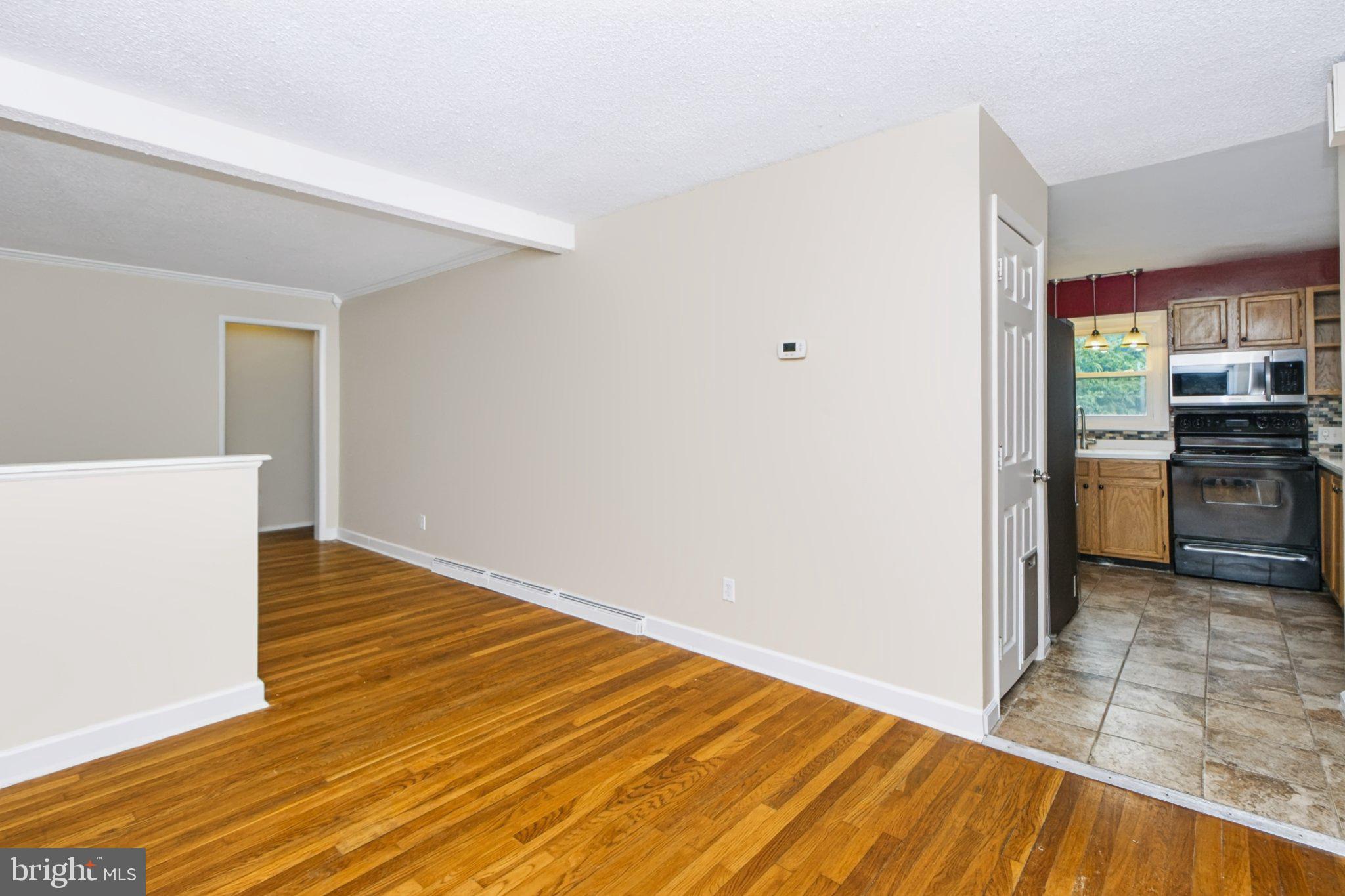 490 Pine Ridge Circle Lewisberry, PA 17339 - Photo 10 of 28 Spacious living area with modern charm.