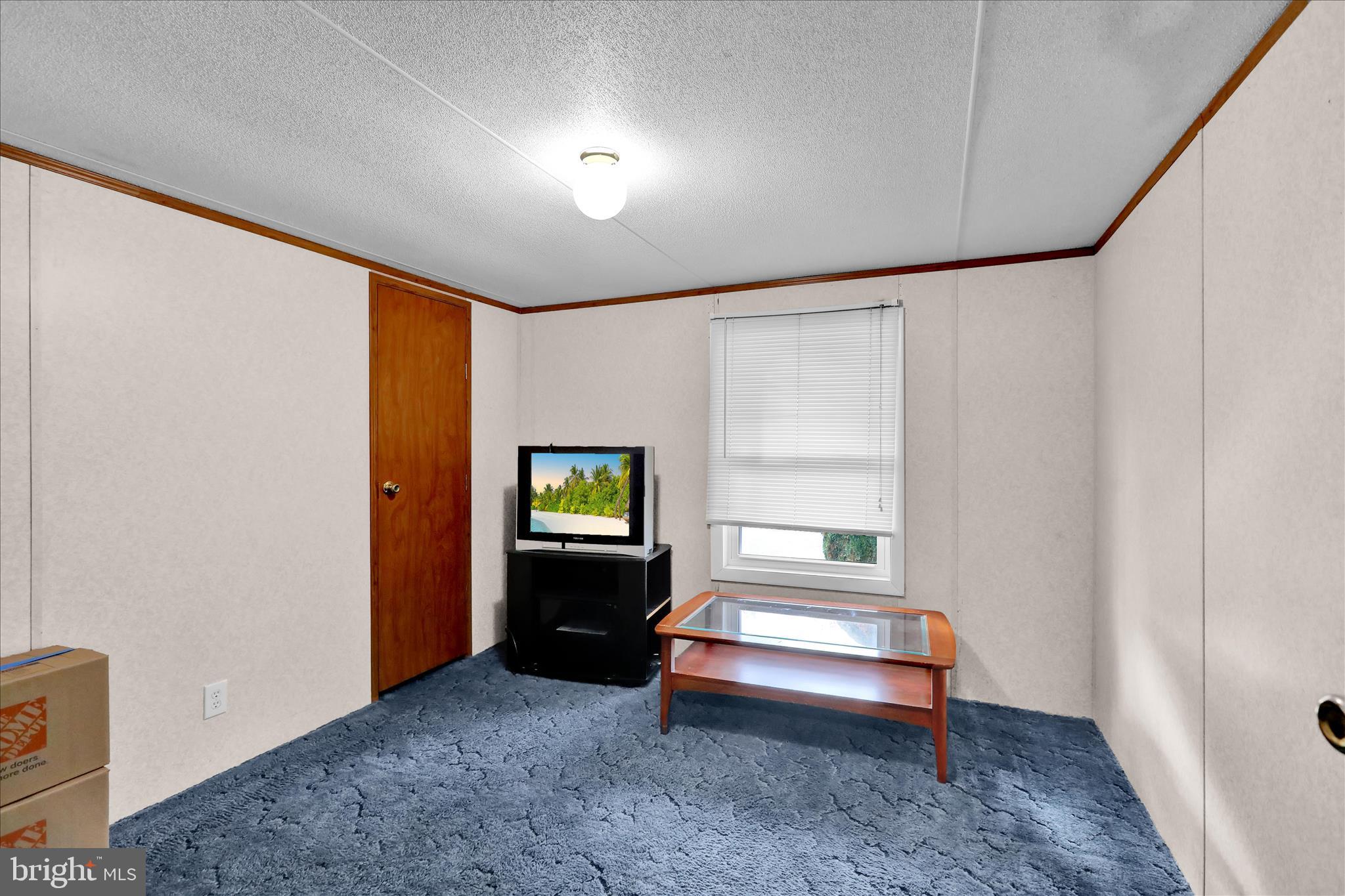 8758 Turkey Ridge Road Breinigsville, PA 18031 - Photo 22 of 29 a spacious bedroom with a bed and a window