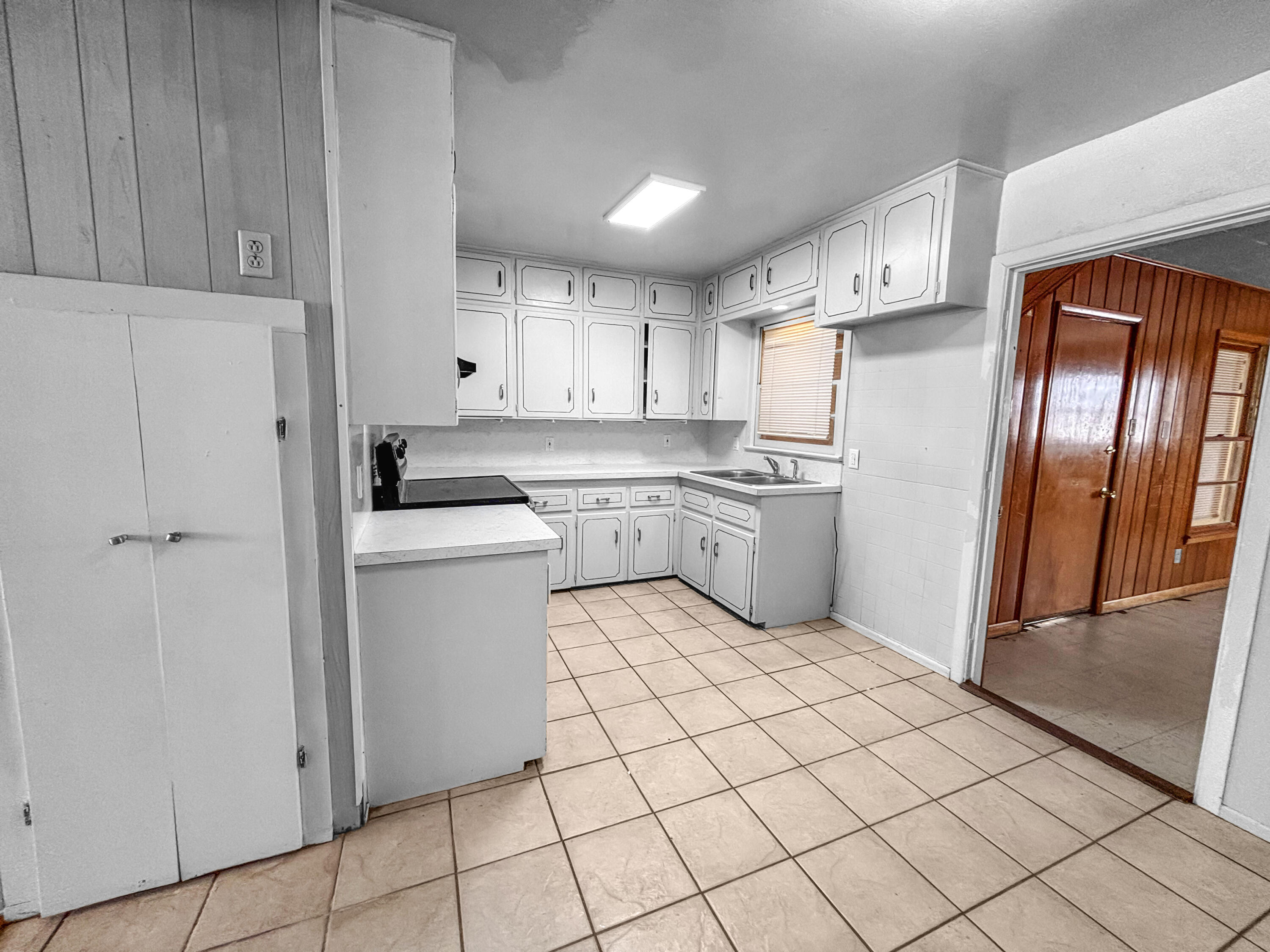 4411 45th Street Lubbock, TX 79414 - Photo 10 of 44 a kitchen with stainless steel appliances granite countertop a refrigerator sink and cabinets