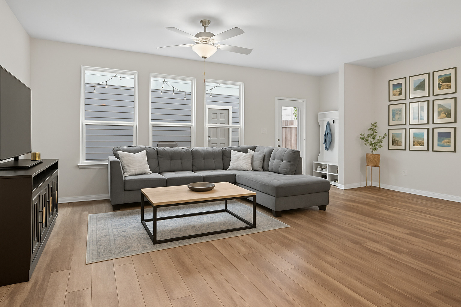 313 Toddy Way Leander, TX 78641 - Photo 10 of 39 Living room with light wood-style floors and a ceiling fan