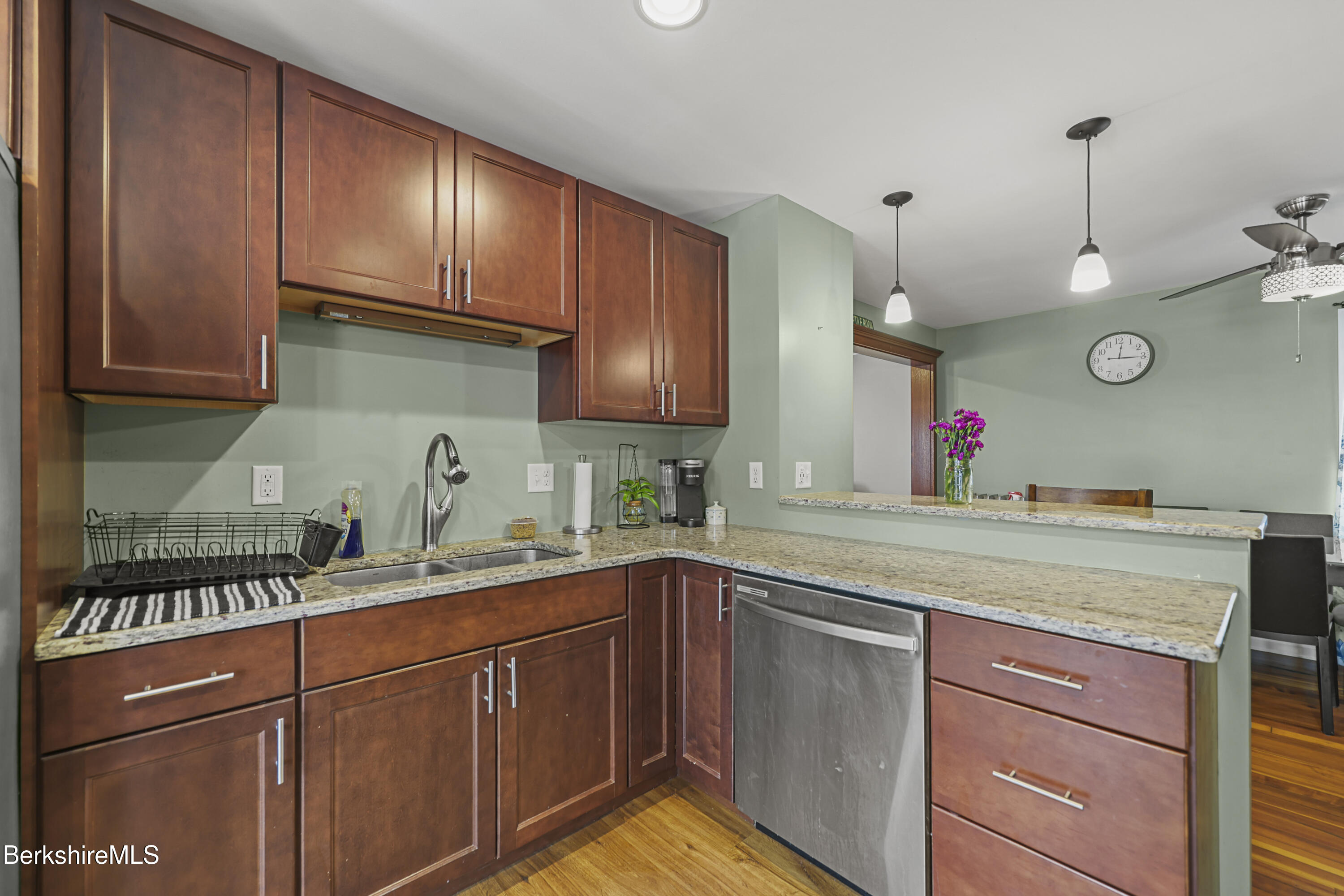 40 Stearns Avenue Pittsfield, MA 01201 - Photo 11 of 25 a kitchen with a sink and cabinets