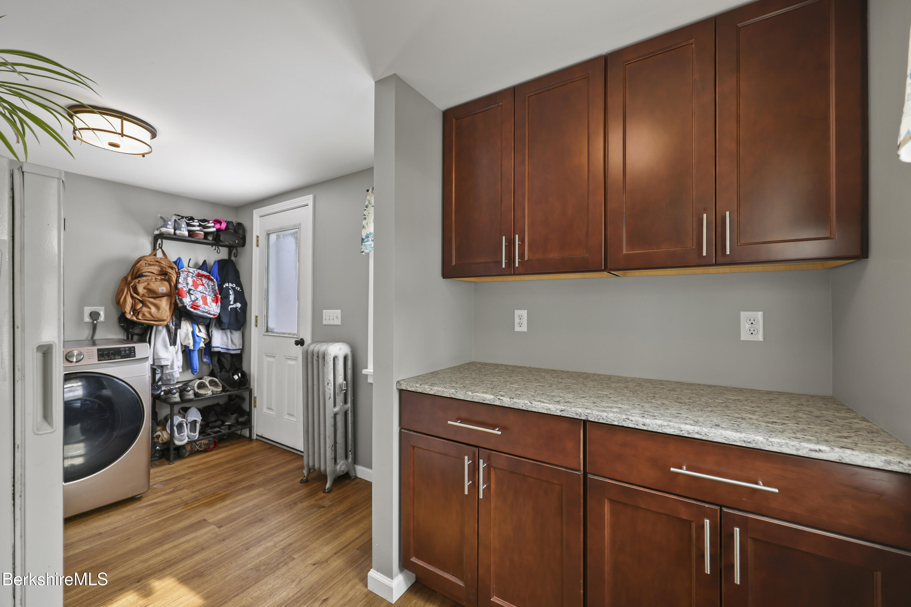 40 Stearns Avenue Pittsfield, MA 01201 - Photo 12 of 25 a view of a storage and utility room with washer and dryer