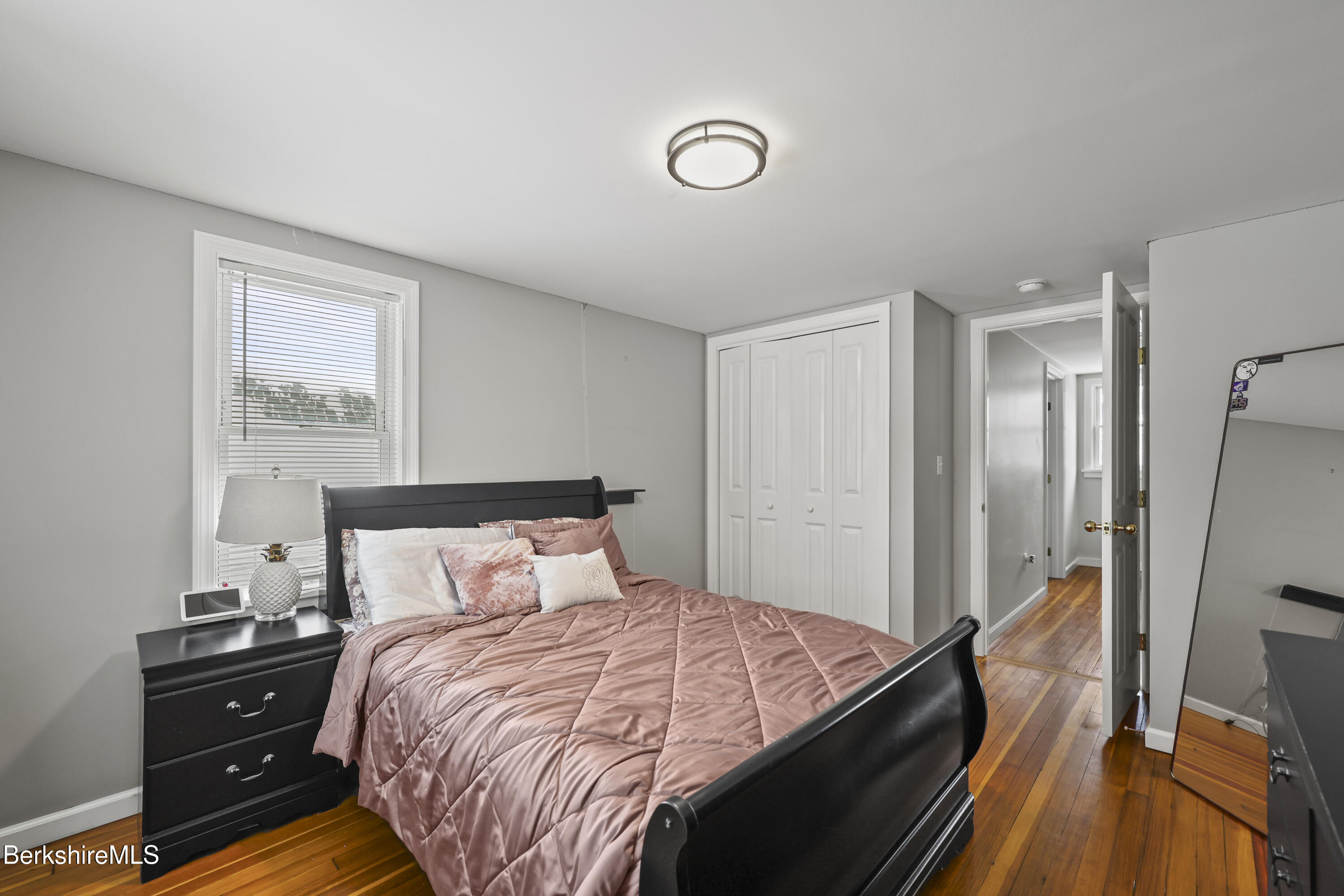 40 Stearns Avenue Pittsfield, MA 01201 - Photo 19 of 25 a bedroom with a bed and a dresser