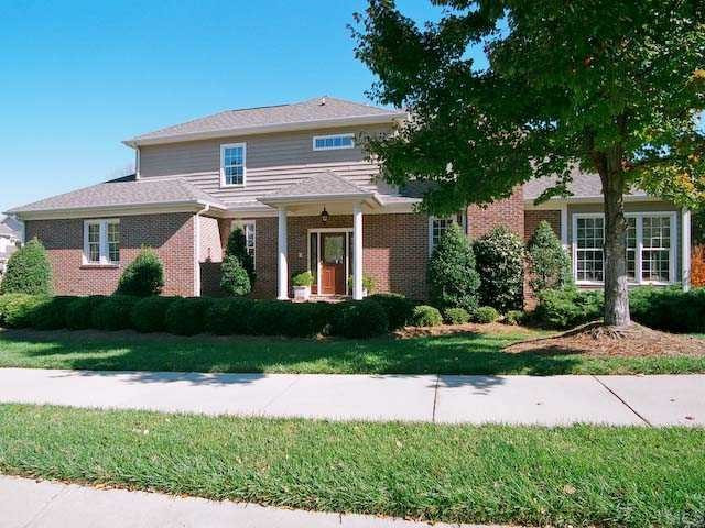 Great curb appeal and you dont have to take care of the lawn. Exterior Front
