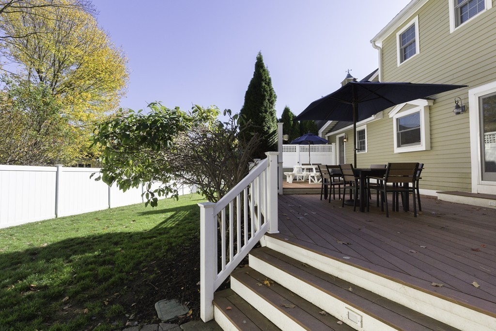 18 Paige Farm Road Amesbury, MA 01913 - Photo 11 of 28 a view of a house with backyard and sitting area