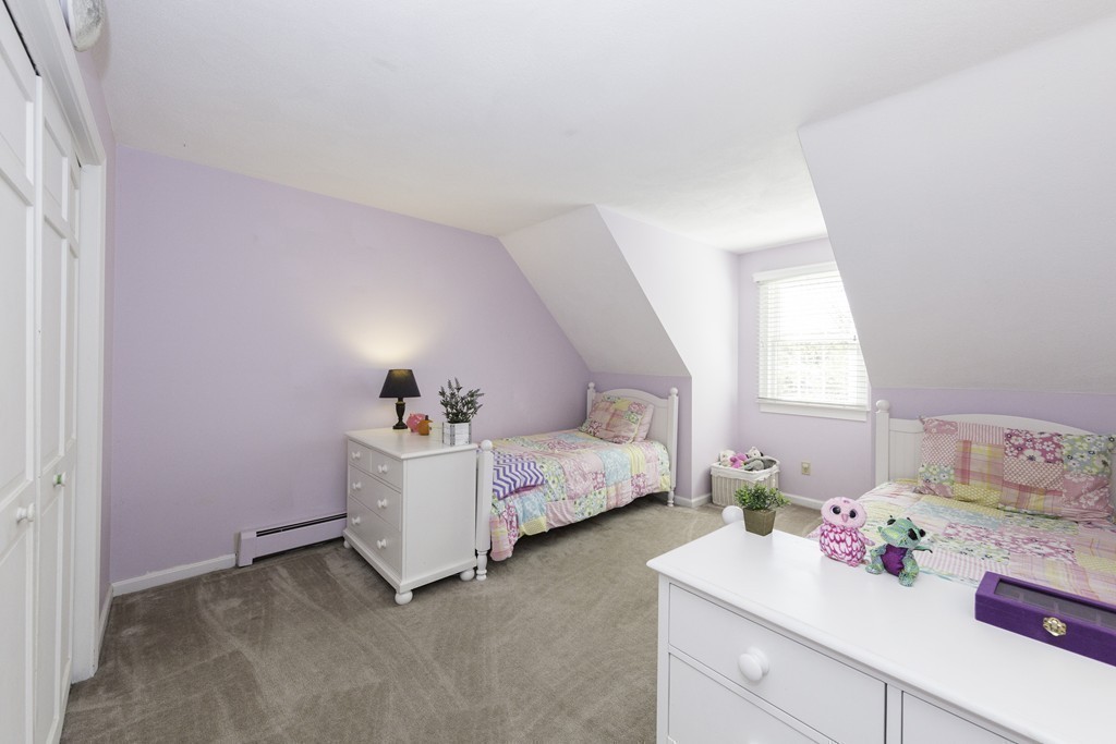 18 Paige Farm Road Amesbury, MA 01913 - Photo 20 of 28 a room with a bed and a dresser