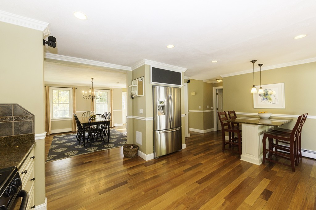 18 Paige Farm Road Amesbury, MA 01913 - Photo 9 of 28 a view of a dining room with furniture and wooden floor