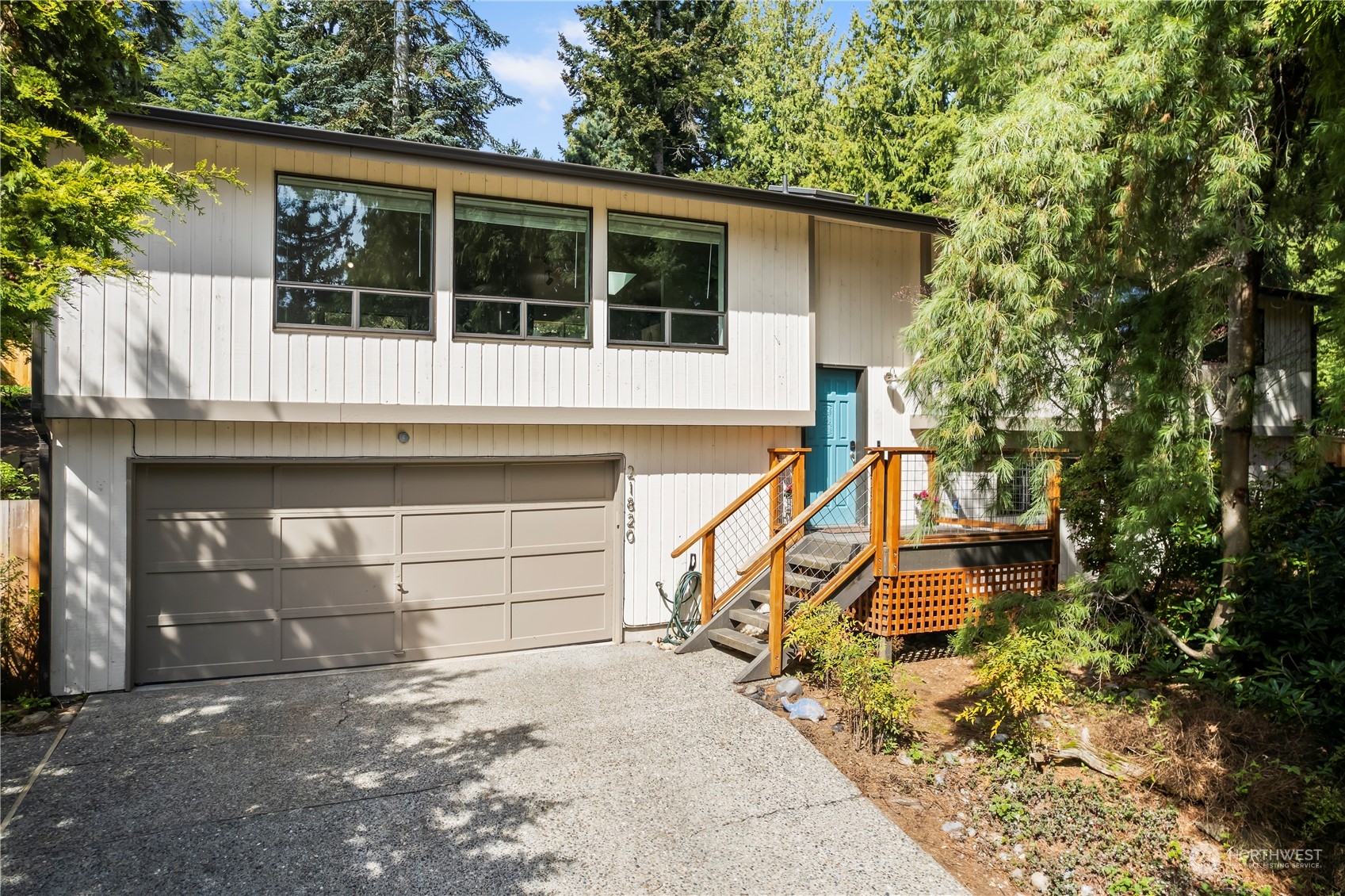 21820 3rd Drive Southeast Bothell, WA 98021 - Photo 1 of 25 a house with trees in front of it