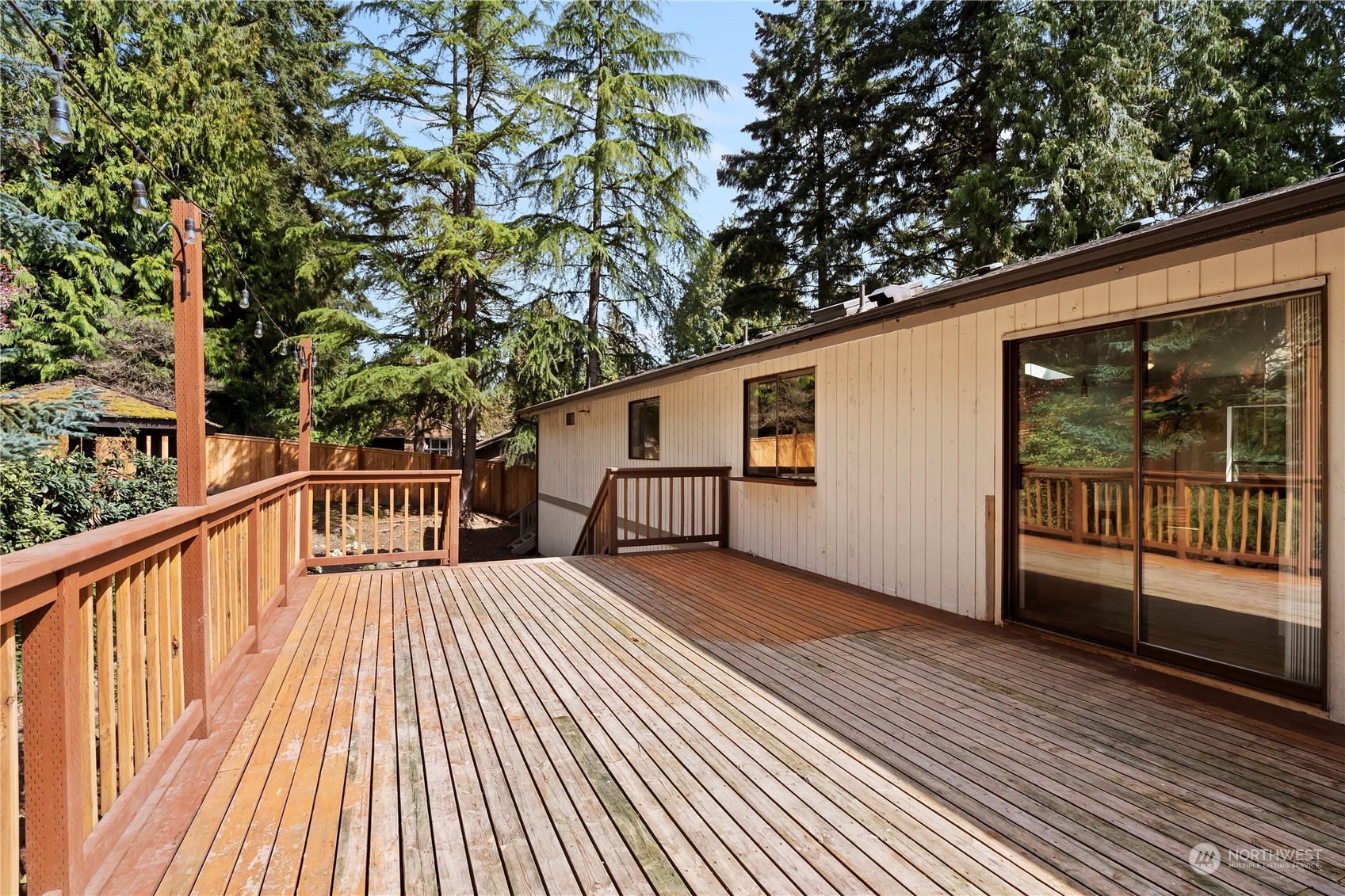 21820 3rd Drive Southeast Bothell, WA 98021 - Photo 25 of 25 a view of backyard with a deck and wooden floor
