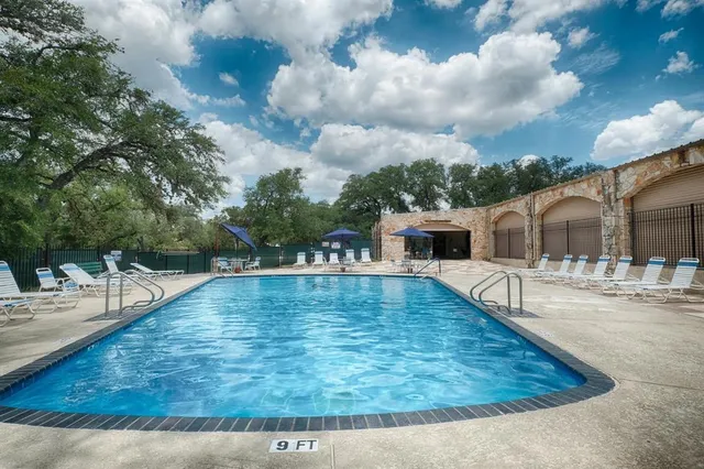 a view of a house with swimming pool