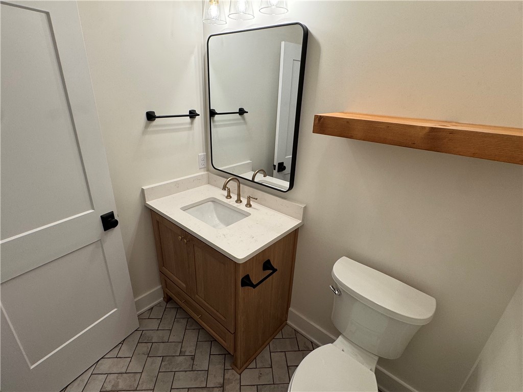 194 Piney Bluff Road Waverly, GA 31565 - Photo 36 of 36 Half Bath next to side door of garage