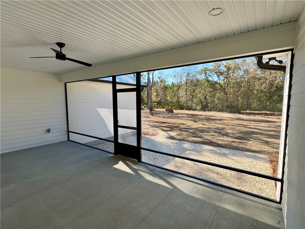 194 Piney Bluff Road Waverly, GA 31565 - Photo 7 of 36 Screened Back Porch Inside View