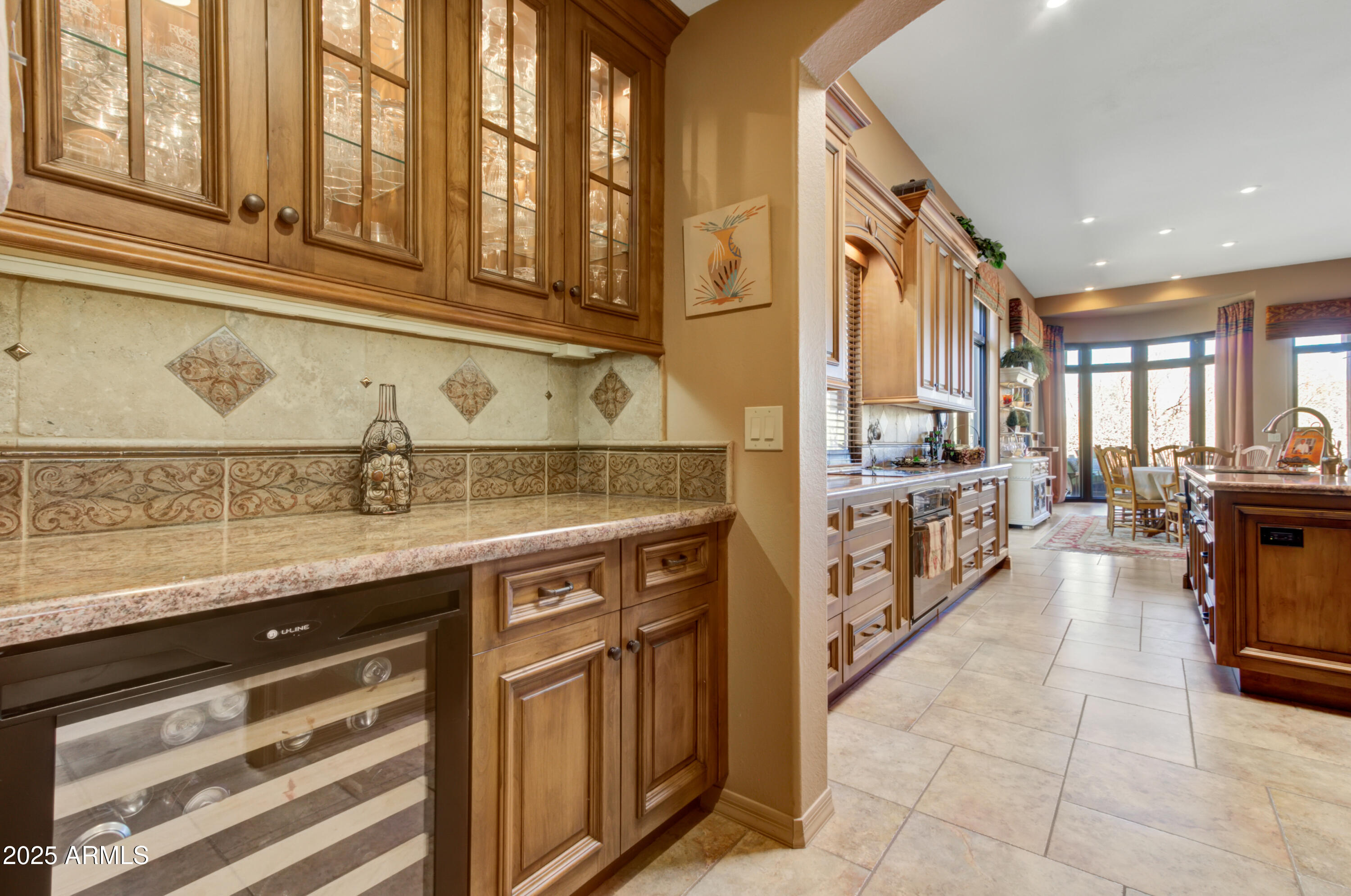 18626 Amarado Circle Rio Verde, AZ 85263 - Photo 5 of 19 a kitchen with stainless steel appliances granite countertop a stove and cabinets