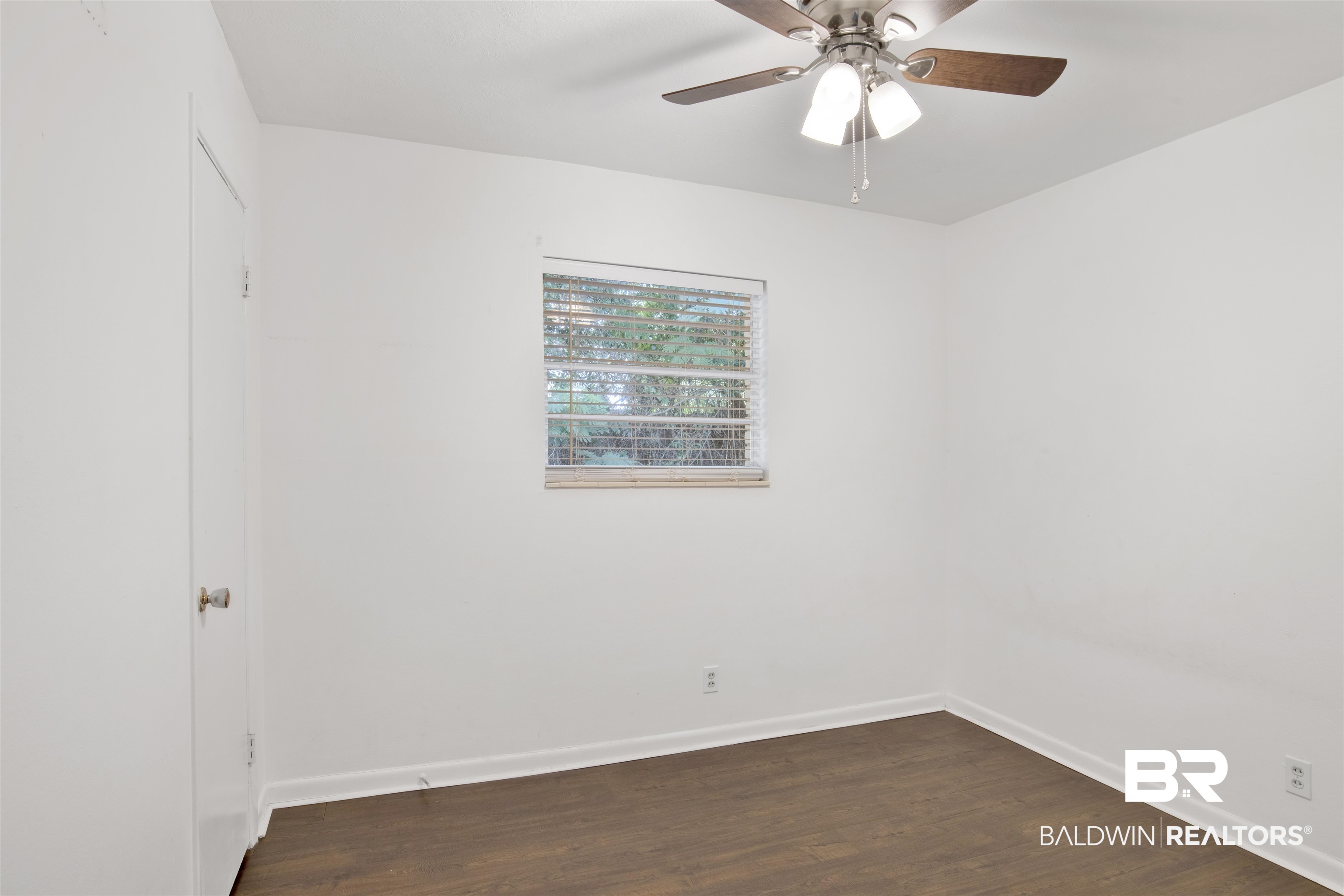 2 Lee Circle Daphne, AL 36527 - Photo 10 of 21 Empty room with hardwood / wood-style floors and ceiling fan