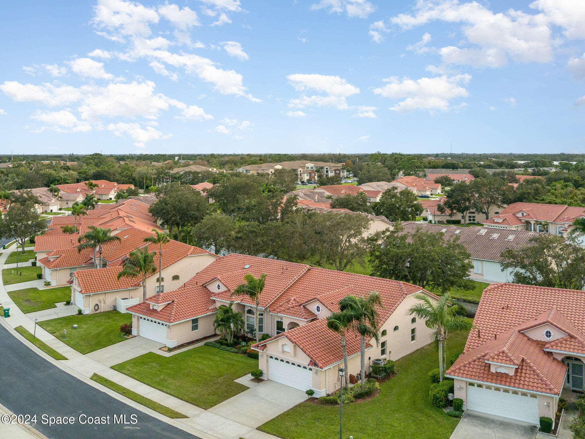 511 Shell Cove Drive Melbourne, FL 32940 - Photo 25 of 31 an aerial view of a house with a garden
