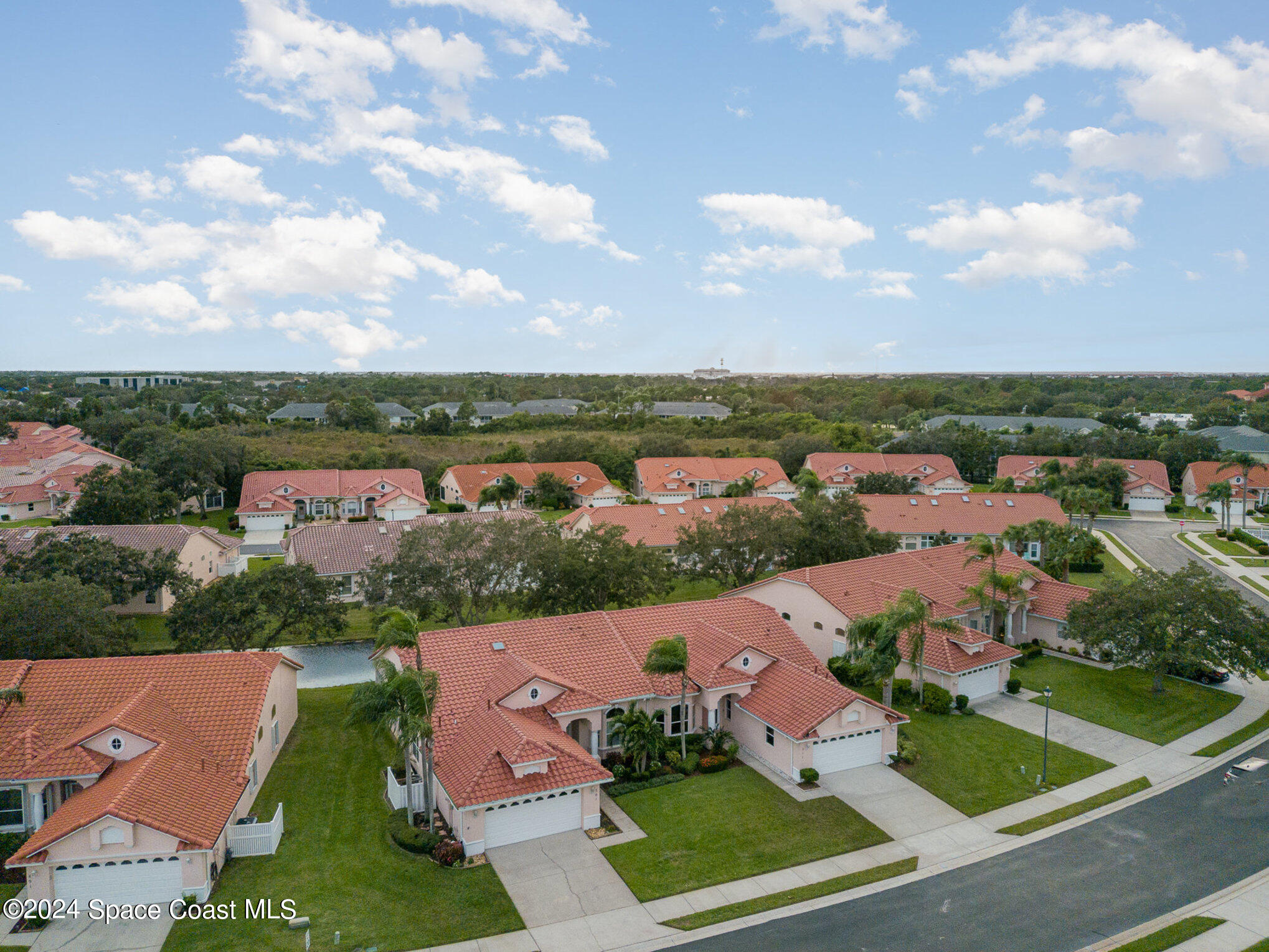 511 Shell Cove Drive Melbourne, FL 32940 - Photo 26 of 31 an aerial view of residential houses with outdoor space