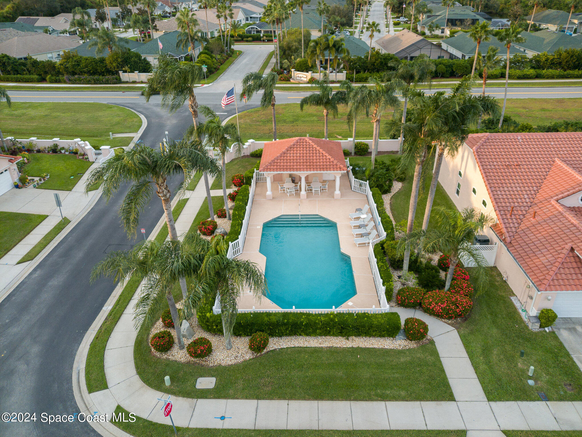 511 Shell Cove Drive Melbourne, FL 32940 - Photo 28 of 31 a view of a swimming pool with a yard