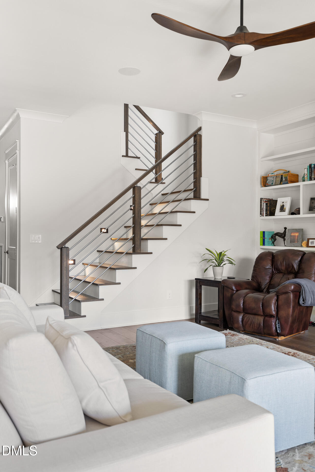 3025 Eden Harbor Court Raleigh, NC 27613 - Photo 9 of 44 a living room with furniture and stairs