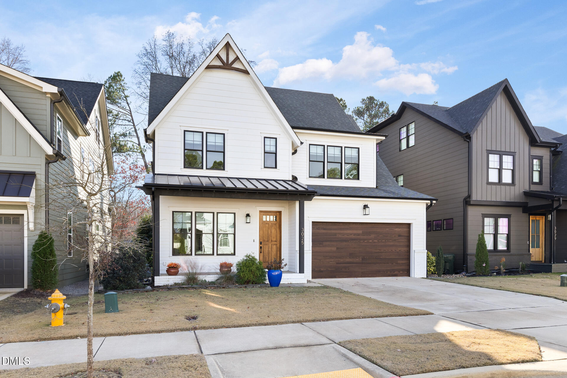 3025 Eden Harbor Court Raleigh, NC 27613 - Photo 2 of 44 a front view of a house with a garage