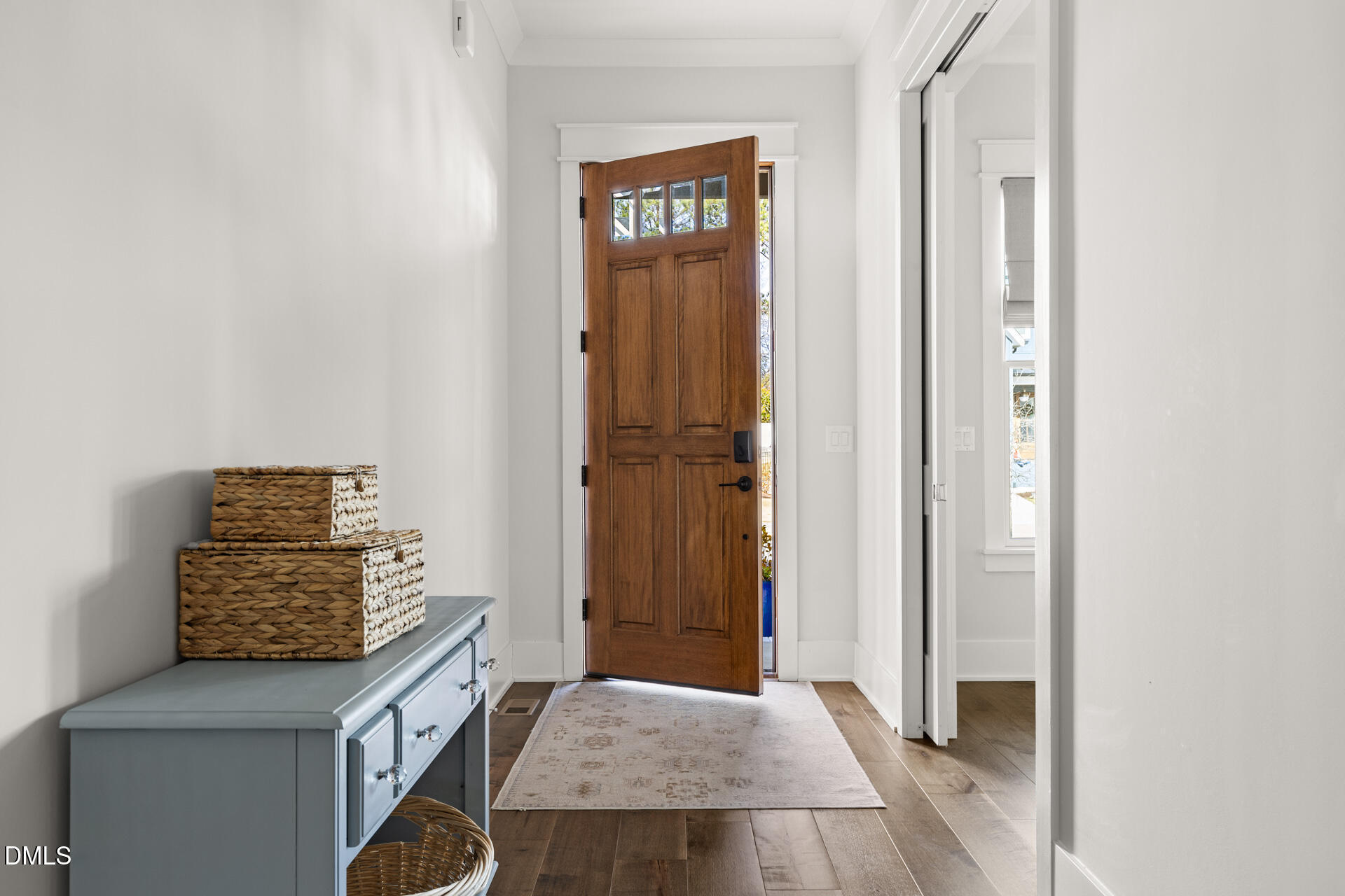 3025 Eden Harbor Court Raleigh, NC 27613 - Photo 3 of 44 a living room with a bed and furniture