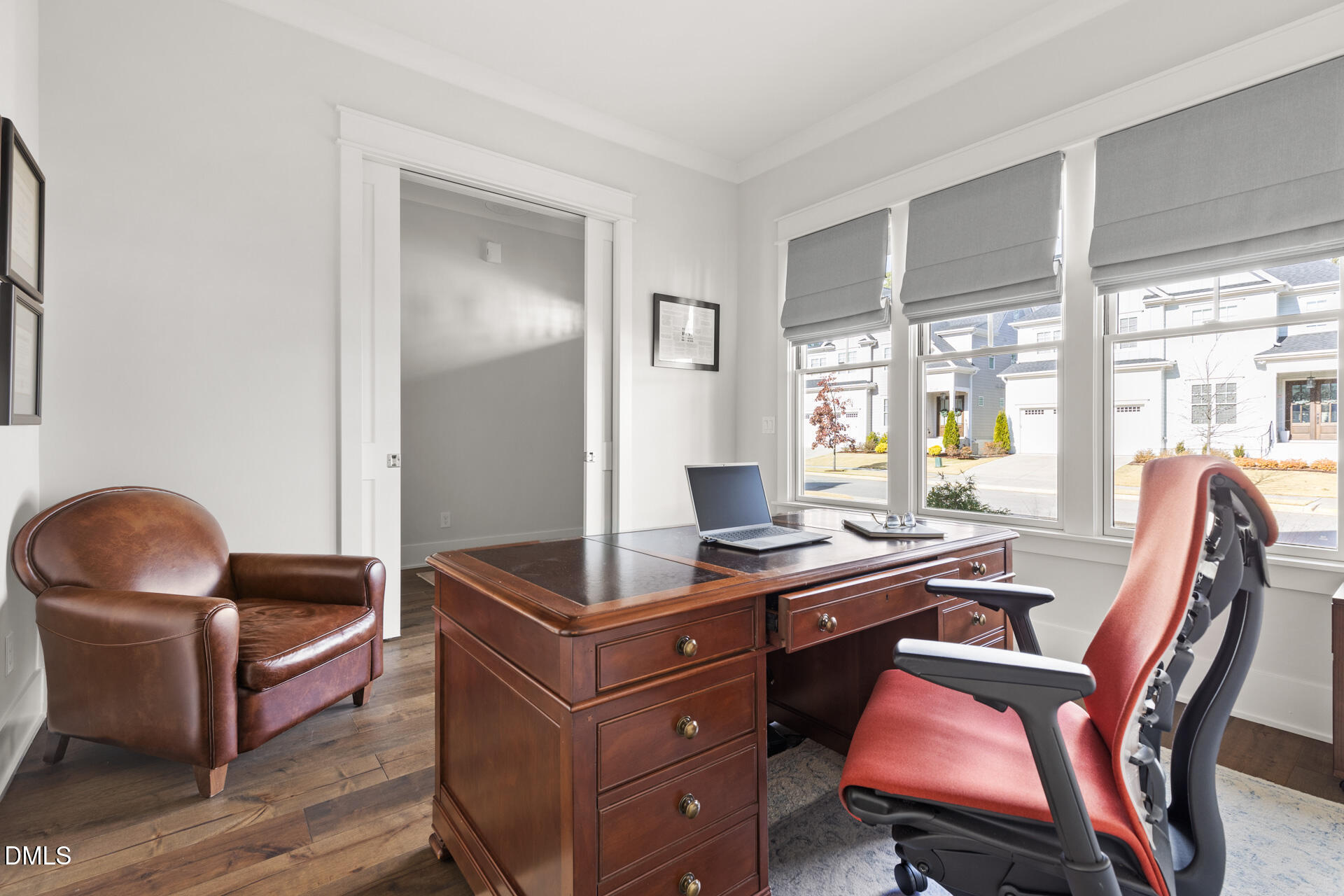 3025 Eden Harbor Court Raleigh, NC 27613 - Photo 5 of 44 a view of a workspace with furniture and a window