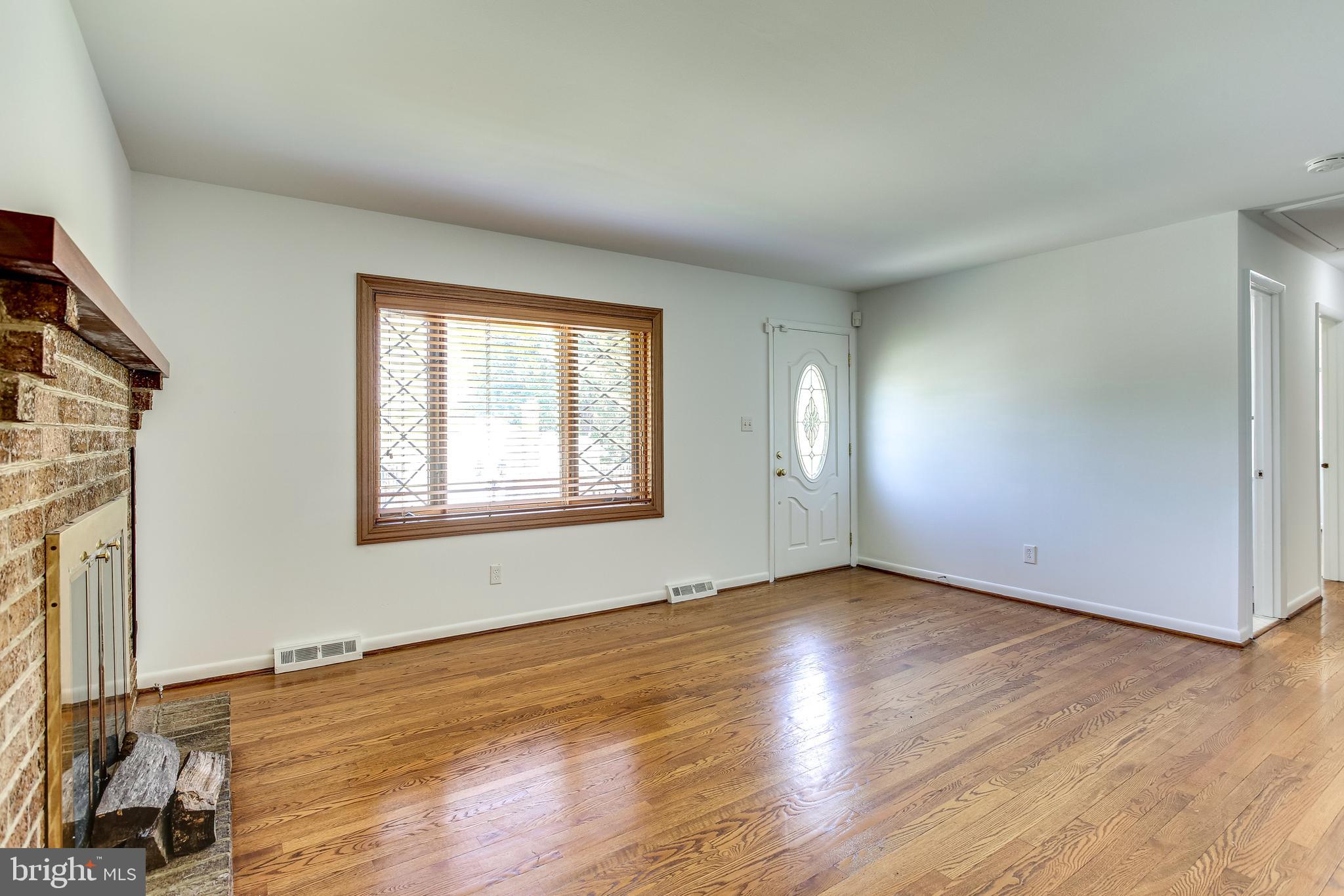 1519 Marsha Road Baltimore, MD 21227 - Photo 2 of 36 Living Room w/ Hardwood Floors