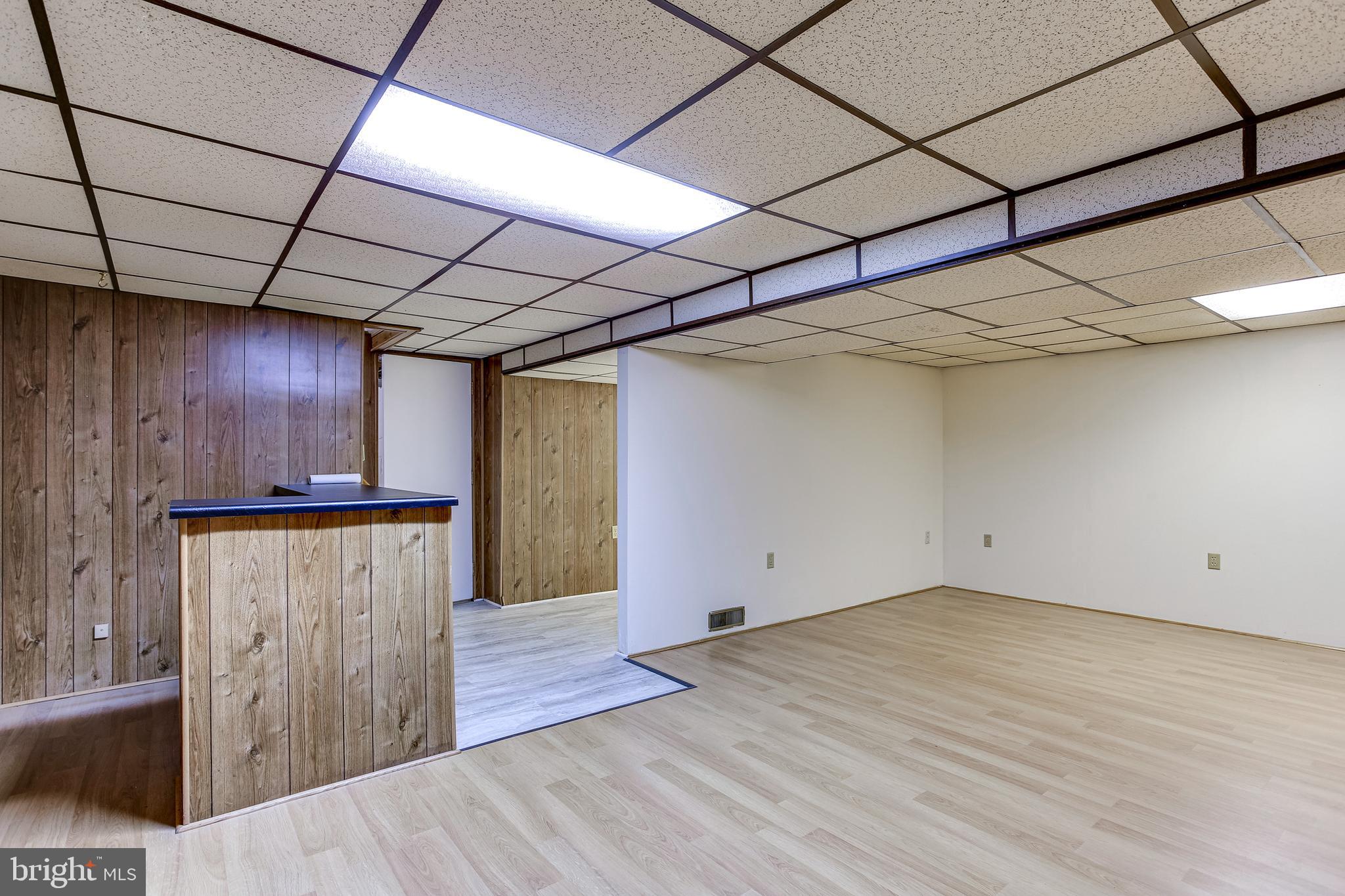 1519 Marsha Road Baltimore, MD 21227 - Photo 27 of 36 Lower Level Family Room w/ Dry Bar