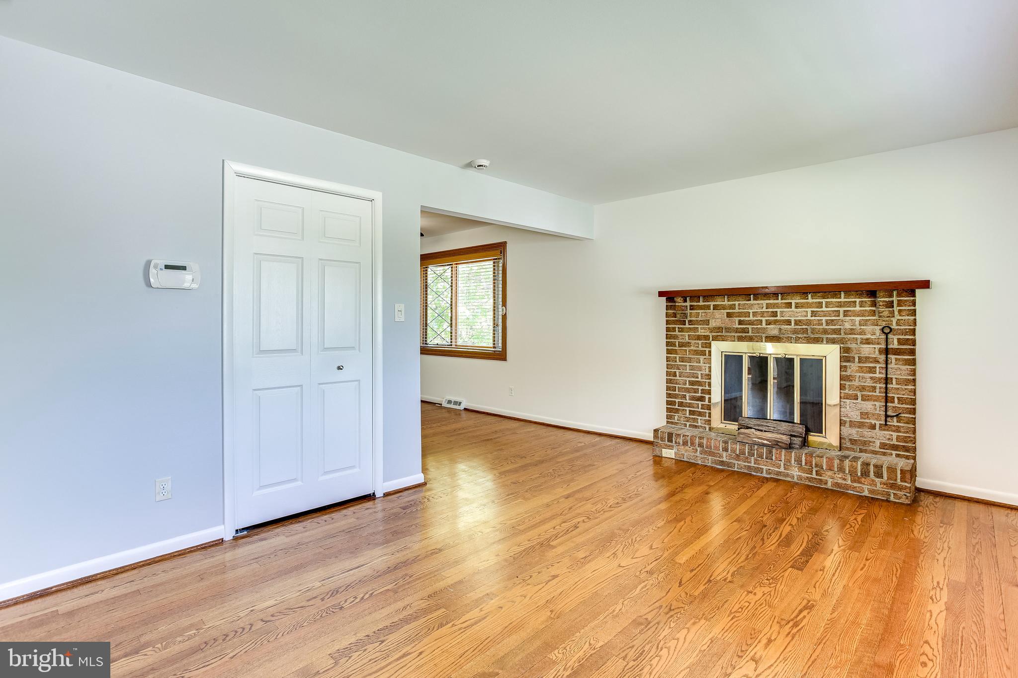 1519 Marsha Road Baltimore, MD 21227 - Photo 4 of 36 Living Room w/ Wood Burning Fireplace