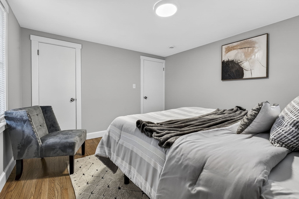 41 Clinton Street Marlborough, MA 01752 - Photo 16 of 26 a bedroom with bed and wooden floor