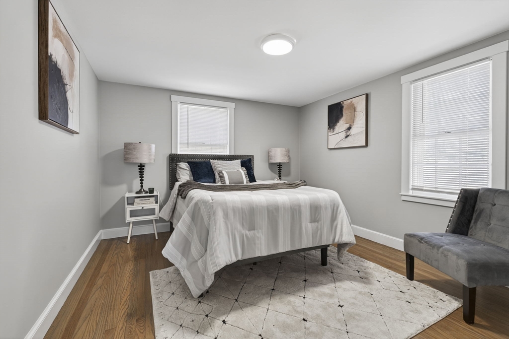 41 Clinton Street Marlborough, MA 01752 - Photo 18 of 26 a bedroom with a bed and a couch