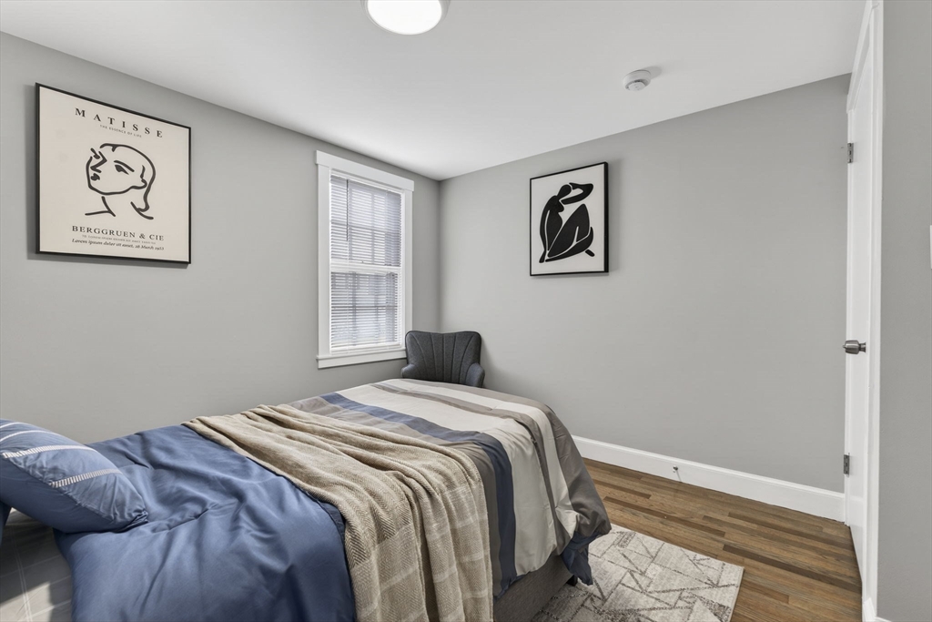 41 Clinton Street Marlborough, MA 01752 - Photo 19 of 26 a bedroom with a bed and a window