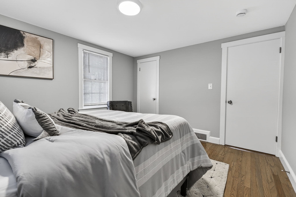 41 Clinton Street Marlborough, MA 01752 - Photo 20 of 26 a bedroom with a bed and a window