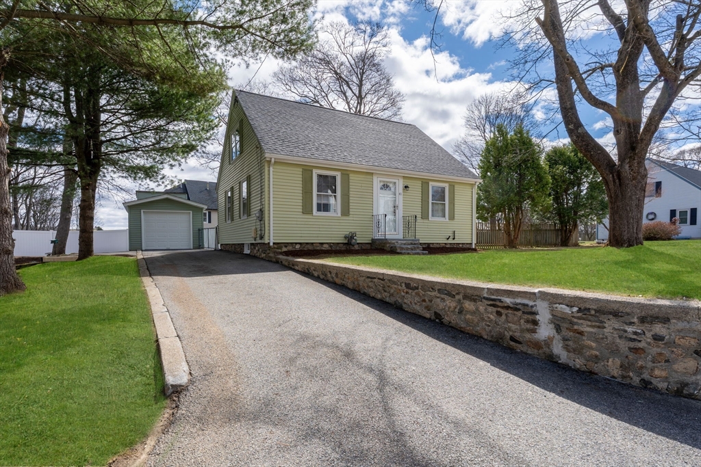 41 Clinton Street Marlborough, MA 01752 - Photo 2 of 26 a front view of a house with a yard