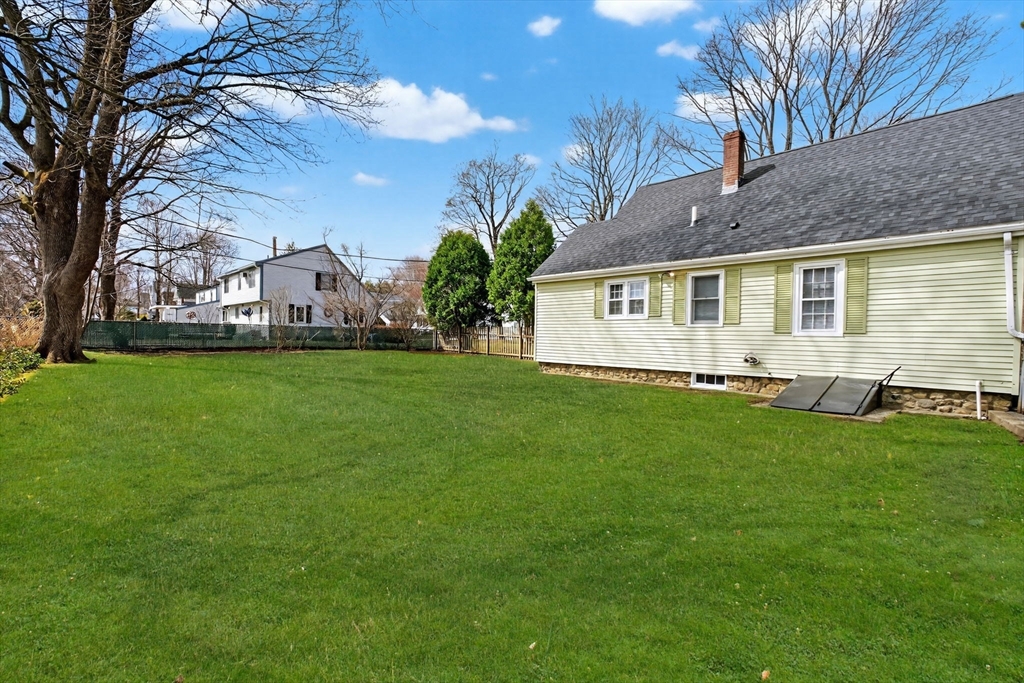 41 Clinton Street Marlborough, MA 01752 - Photo 6 of 26 a front view of house with yard and green space