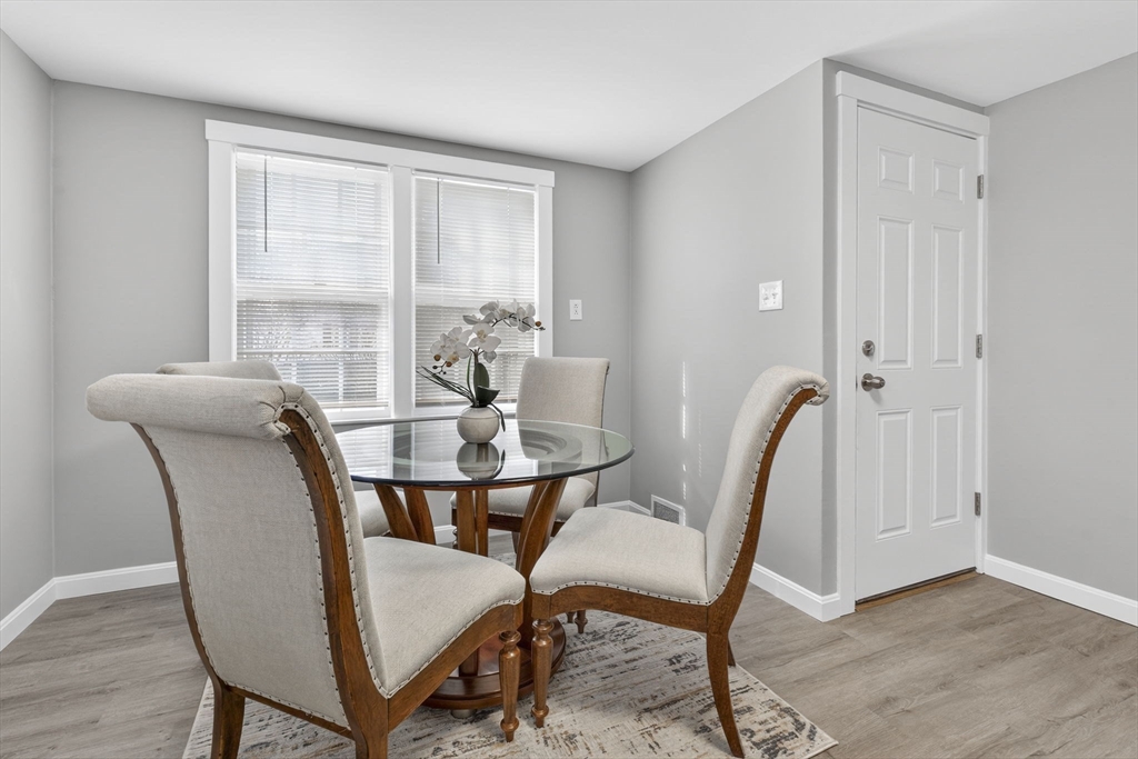 41 Clinton Street Marlborough, MA 01752 - Photo 9 of 26 a view of a dining room with furniture window and wooden floor
