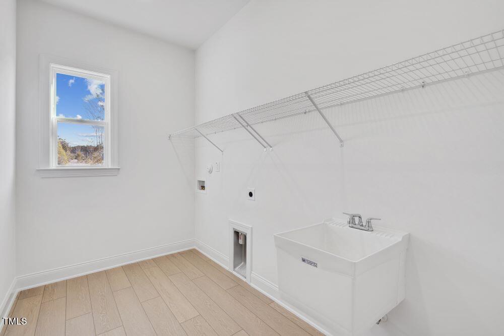 200 Regency Rdg Drive Apex, NC 27539 - Photo 11 of 39 a view of utility room