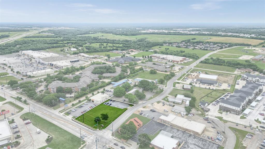 815 East Pecan Grove Road Sherman, TX 75090 - Photo 2 of 12 a view of an outdoor space and a lake view