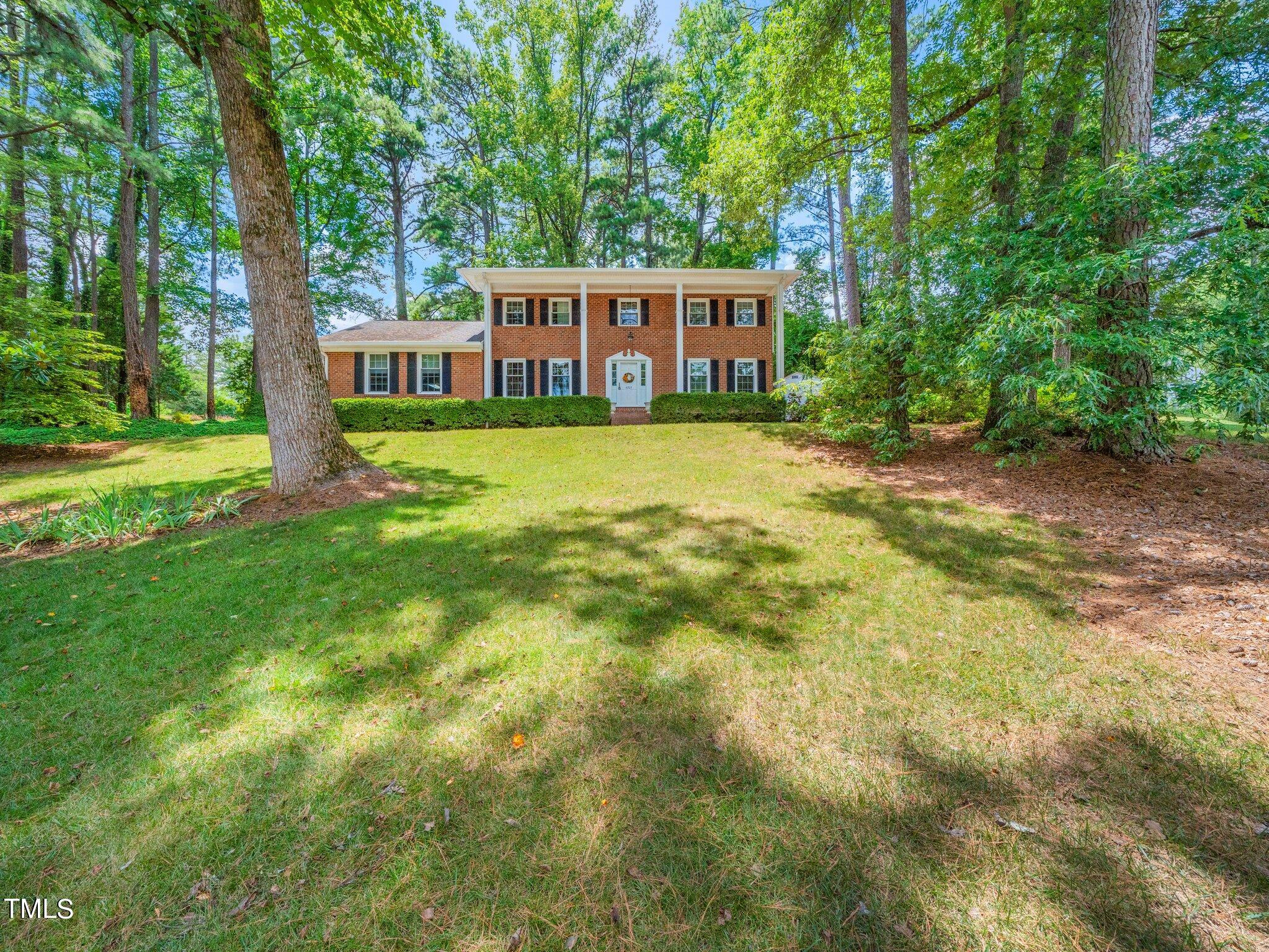 4205 Weaver Drive Raleigh, NC 27612 - Photo 2 of 48 a view of a house with backyard and sitting area