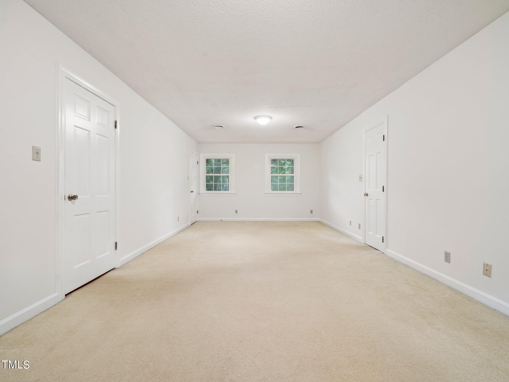 4205 Weaver Drive Raleigh, NC 27612 - Photo 27 of 48 a view of an empty room with a window