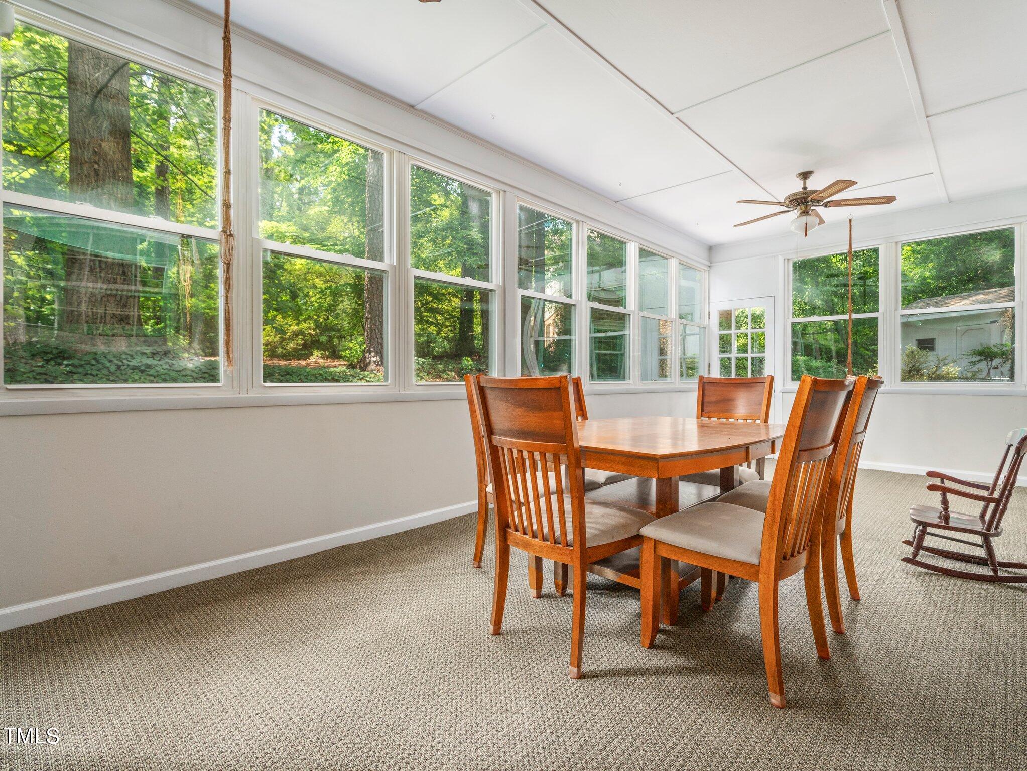 4205 Weaver Drive Raleigh, NC 27612 - Photo 34 of 48 a view of a dining room with furniture window and outside view