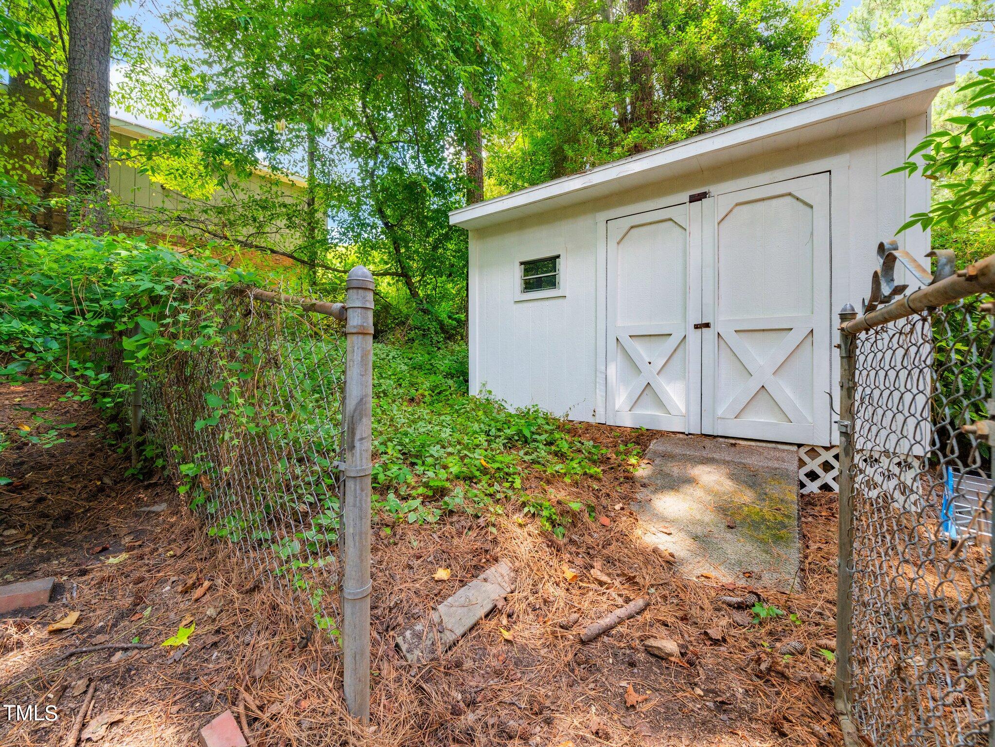 4205 Weaver Drive Raleigh, NC 27612 - Photo 35 of 48 a view of a backyard