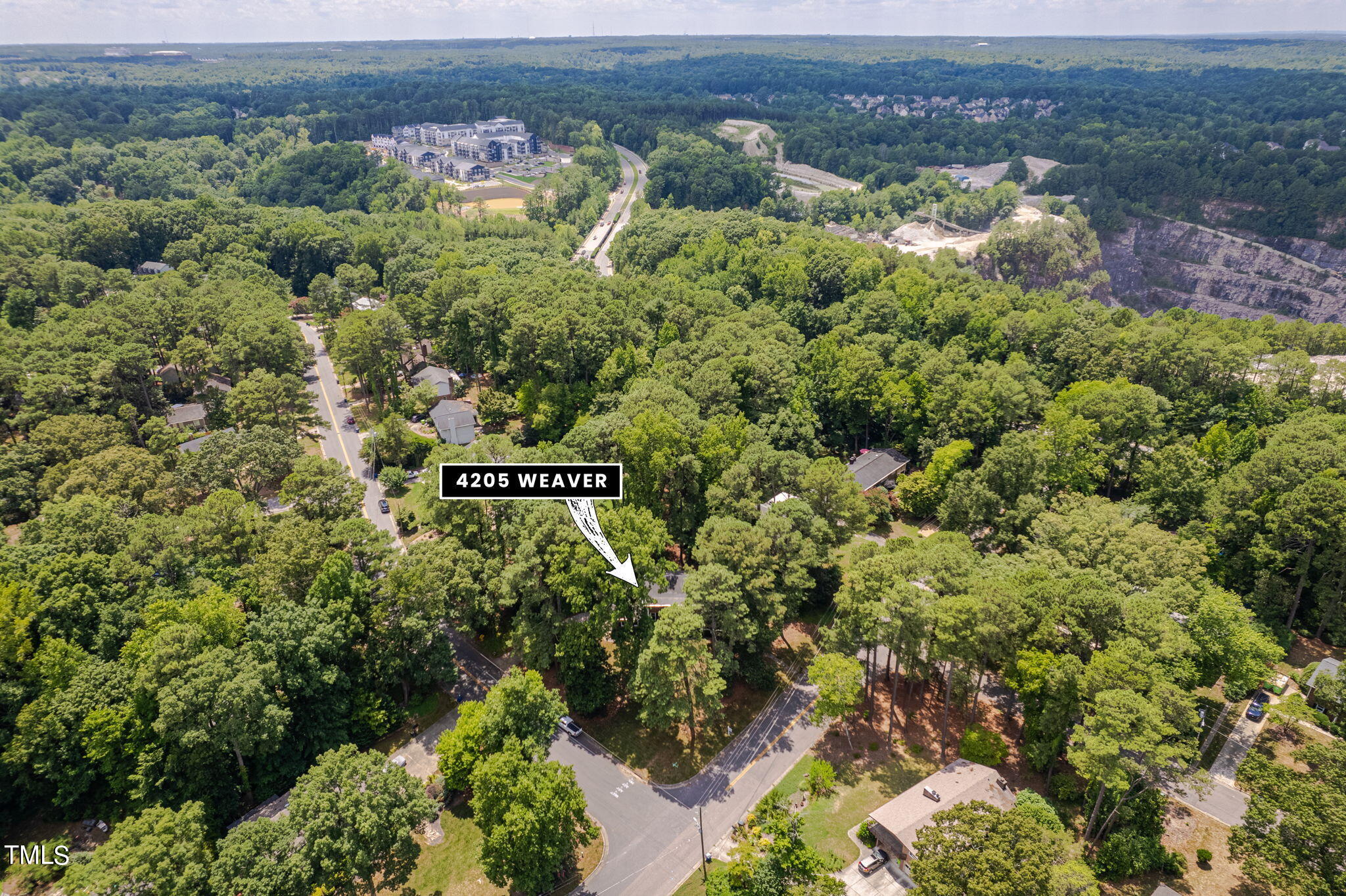 4205 Weaver Drive Raleigh, NC 27612 - Photo 44 of 48 an aerial view of a house with a yard