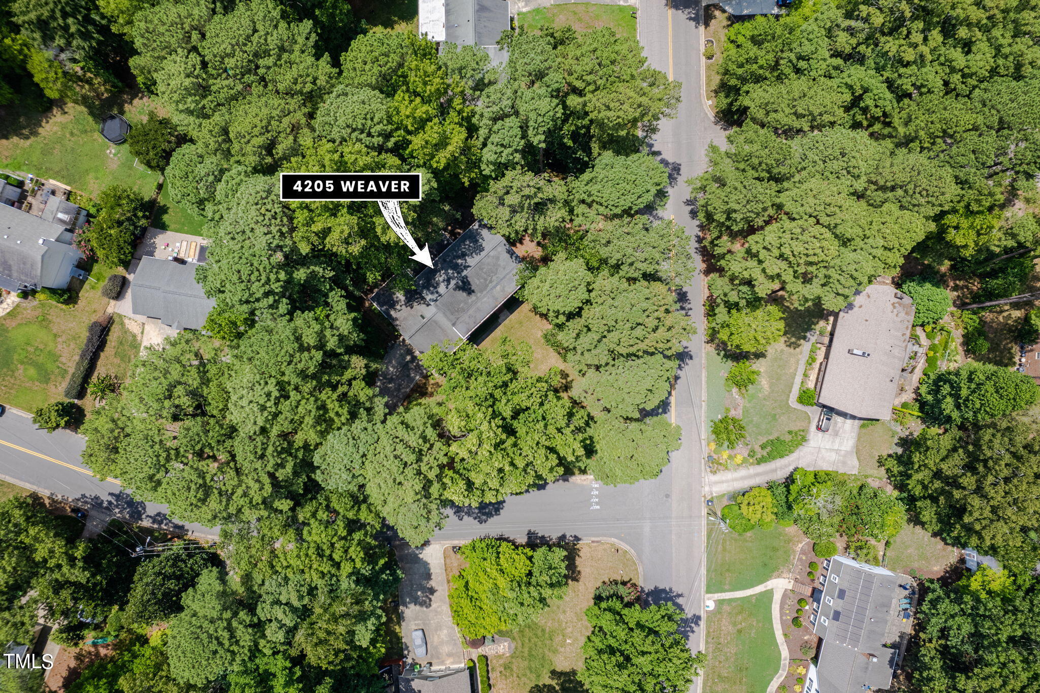 4205 Weaver Drive Raleigh, NC 27612 - Photo 45 of 48 an aerial view of a house with a yard and garden