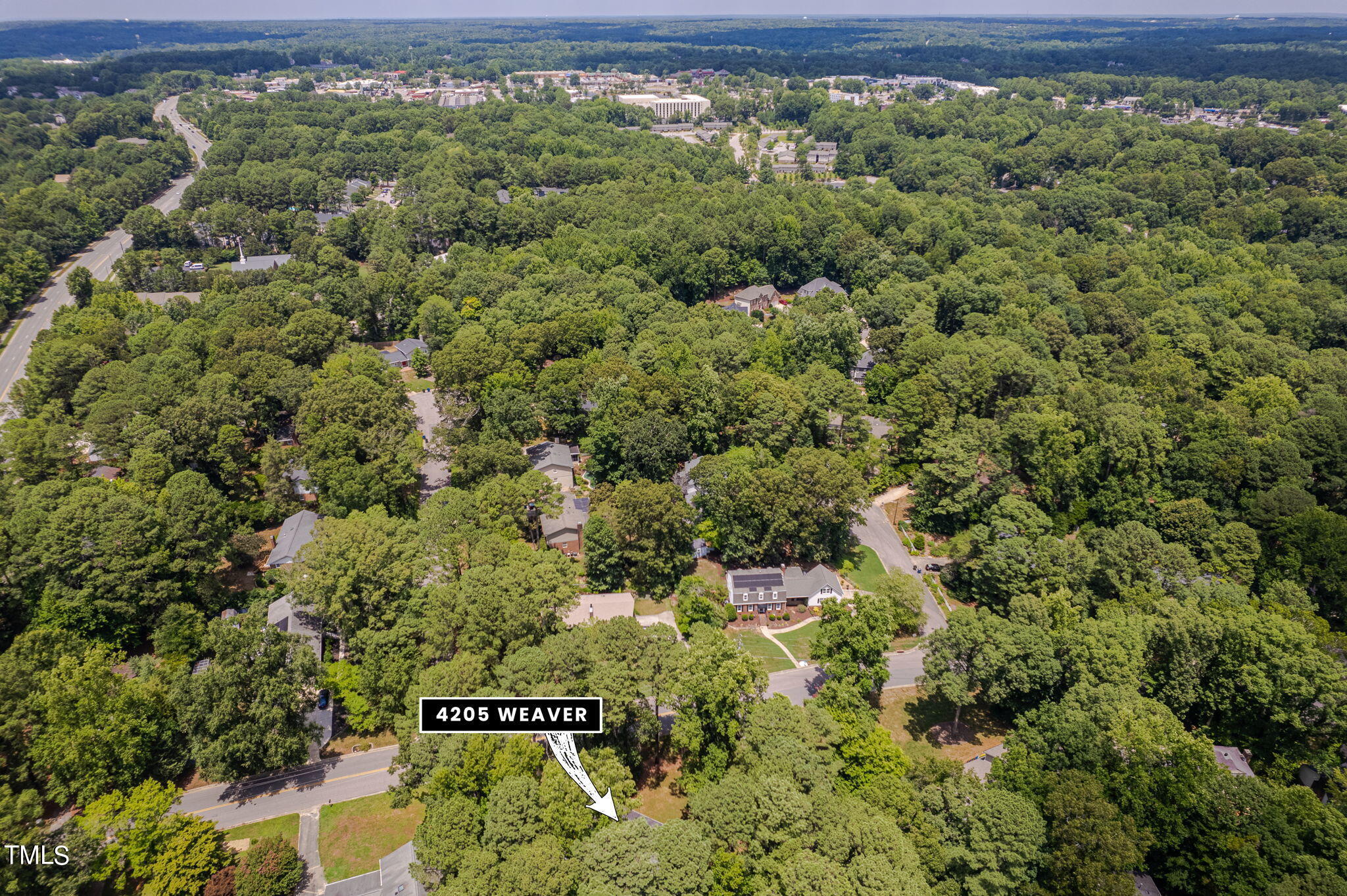 4205 Weaver Drive Raleigh, NC 27612 - Photo 46 of 48 a view of a yard with a street