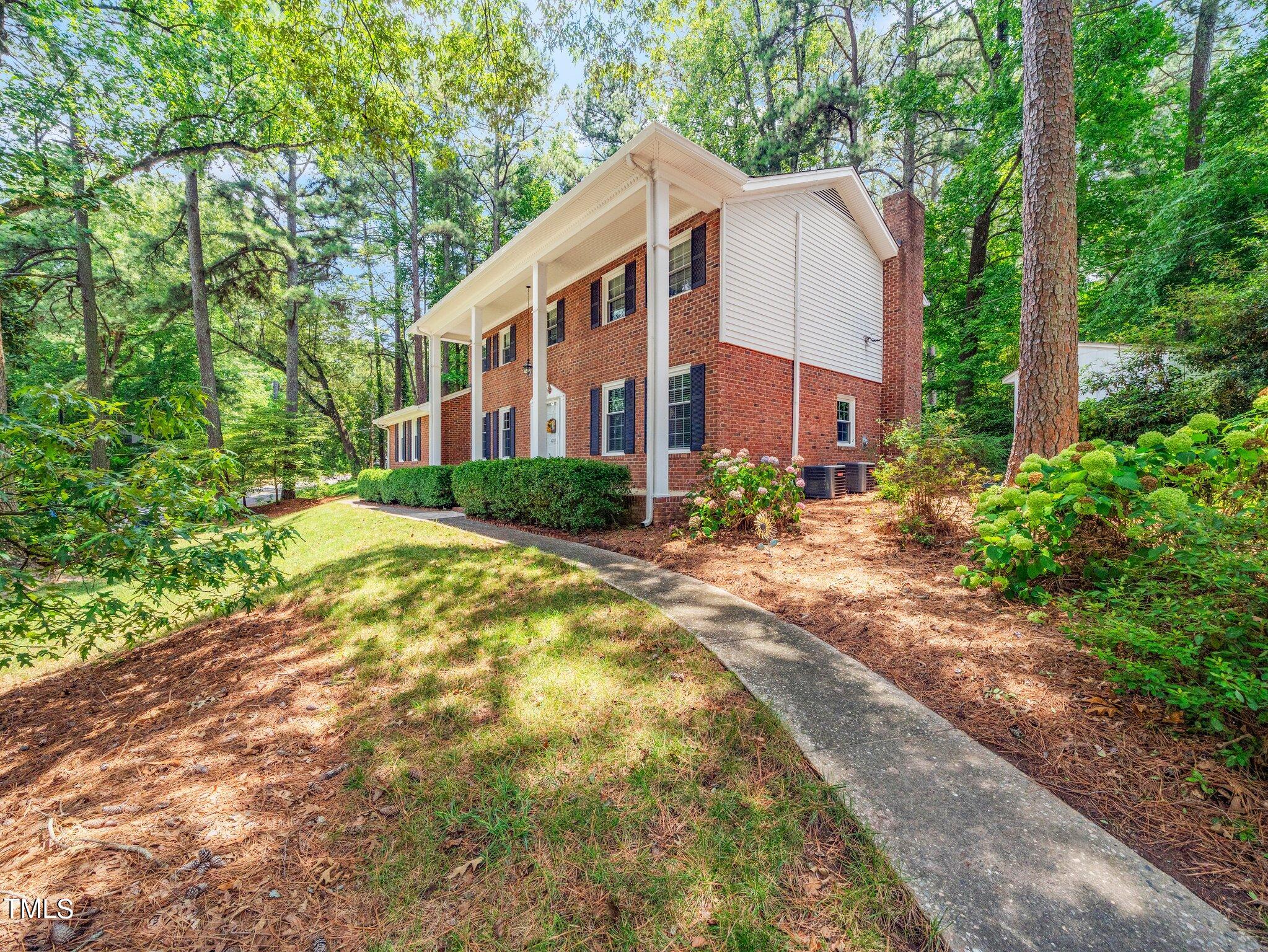 4205 Weaver Drive Raleigh, NC 27612 - Photo 7 of 48 a view of backyard of house with green space