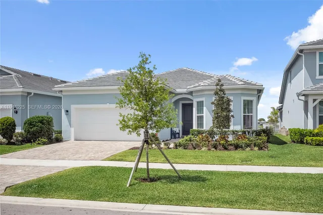 a house with garden in front of it