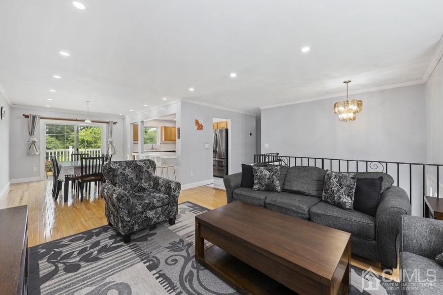 89 Normandy Drive Piscataway, NJ 08854 - Photo 3 of 20 a living room with furniture and a large window