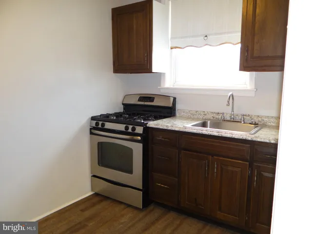 a white refrigerator freezer sitting in a kitchen