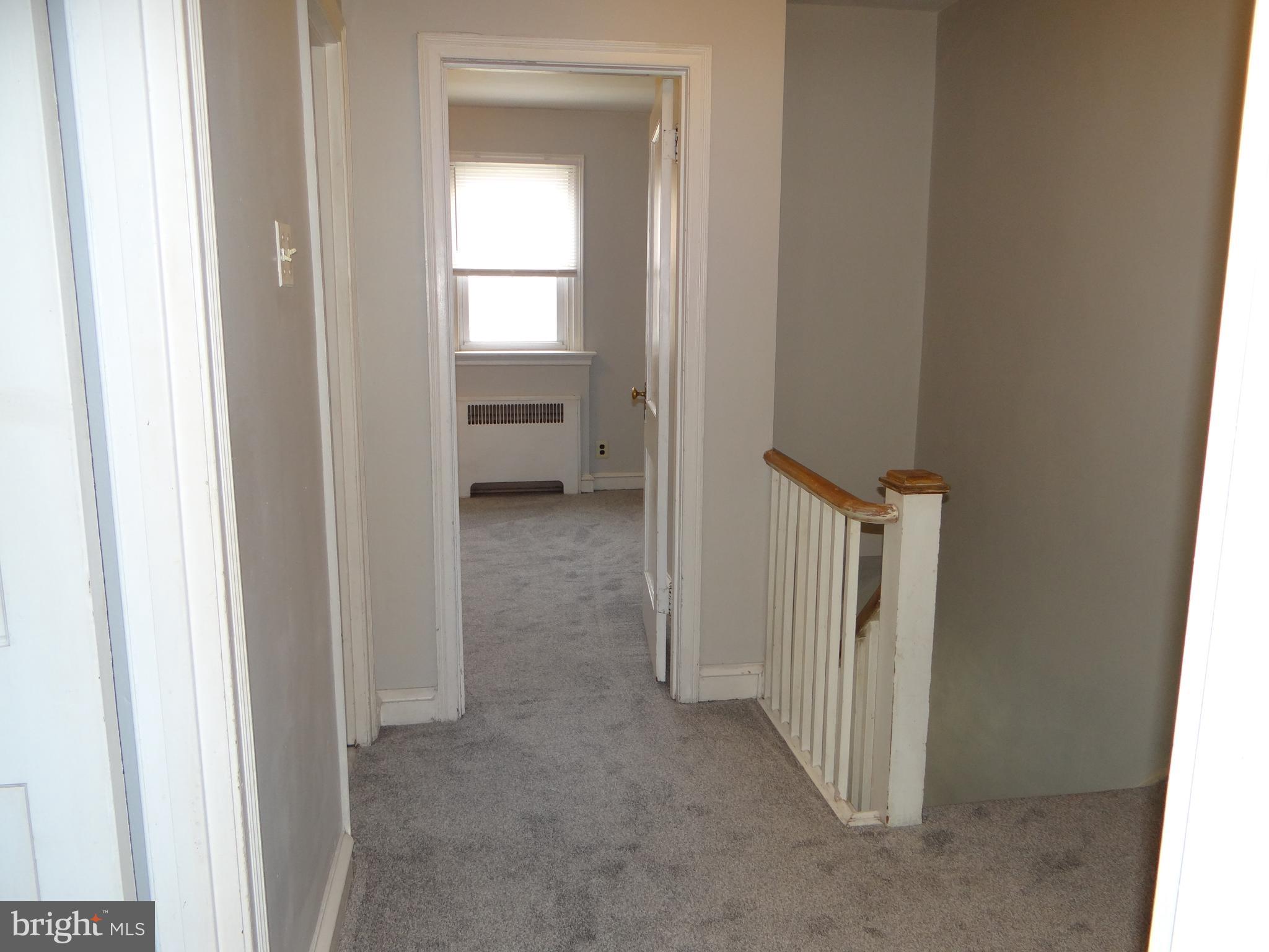 6744 Rutland Street Philadelphia, PA 19149 - Photo 25 of 44 a view of a room that has a bed in it